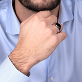 Siegelring mit rundem Stein und Meerjungfrau-Textur