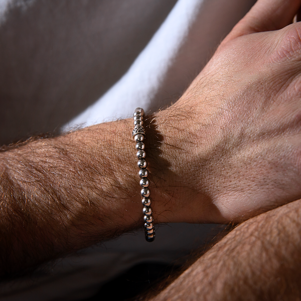Bracelet élastique avec pépites et rondelle de texture sirène